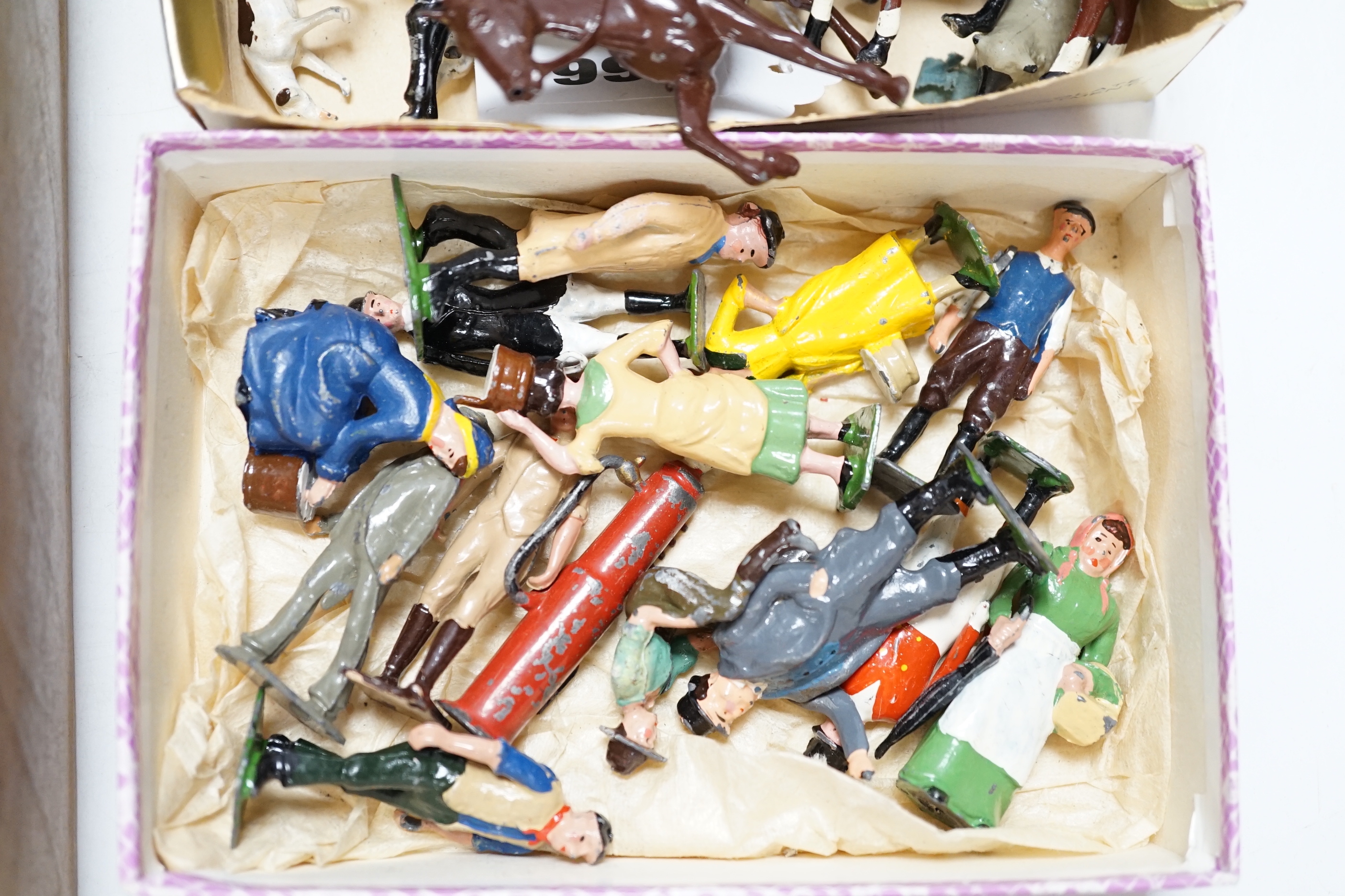 A collection of lead figures by Britains etc. together with farm, animals, fence sections, a Corgi Toys Land Rover, figures from a Britain’s hunt set and a few other items